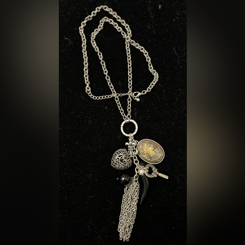 Burnished silver long charm necklace with matching earrings